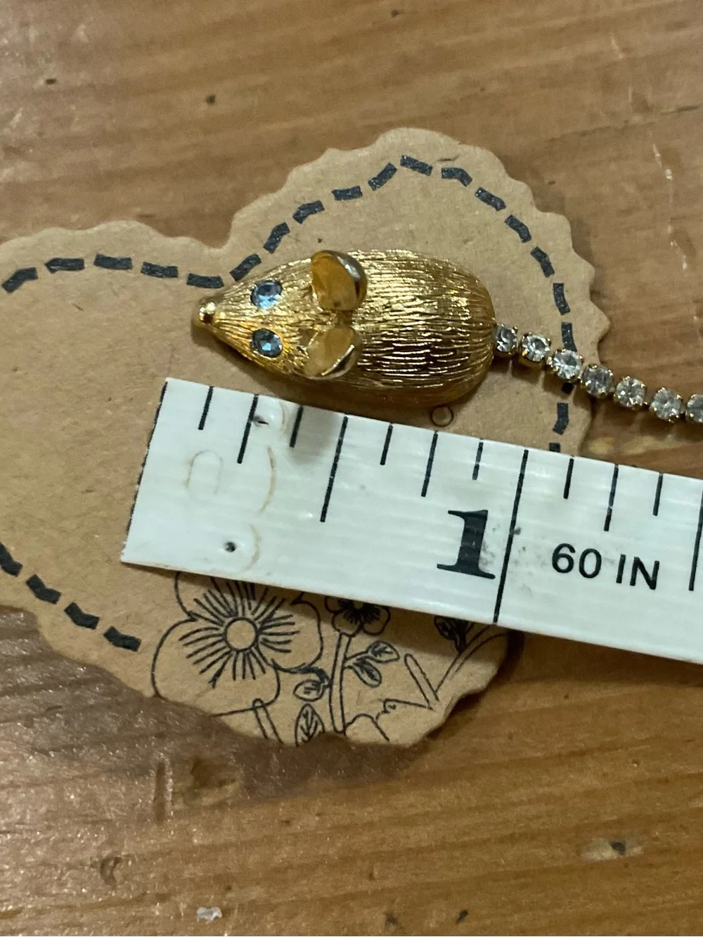 Avon:vintage gold tone/plated Midas the mouse with blue eyes tie tack/pin/brouch